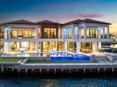 Boca Raton’s Trinity Point Estate Lists for $32.5 Million With 368 Feet of Intracoastal Frontage 3 Trinity Point Estate waterfront mansion in Boca Raton featuring a see-through infinity-edge pool and 368 feet of Intracoastal frontage