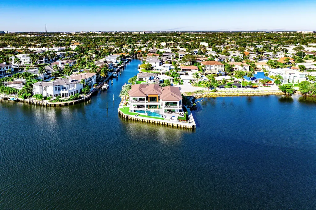 Boca Raton’s Trinity Point Estate Lists for $32.5 Million With 368 Feet of Intracoastal Frontage 2 Aerial view of Trinity Point Estate in Boca Raton showcasing its rare point lot with 368 feet of Intracoastal water frontage