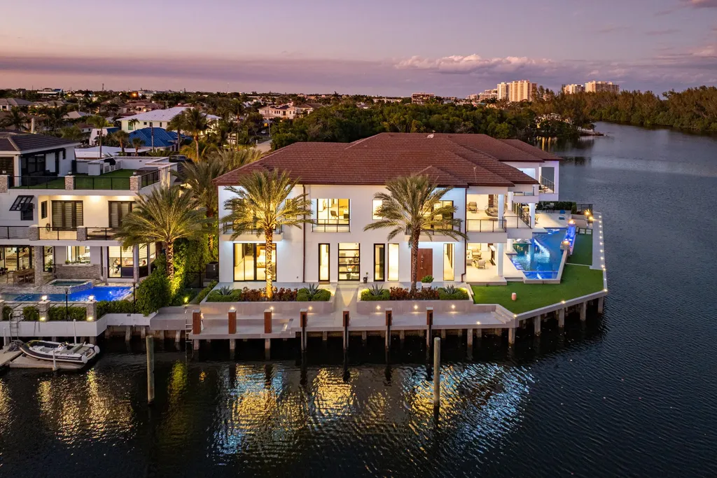 Boca Raton’s Trinity Point Estate Lists for $32.5 Million With 368 Feet of Intracoastal Frontage 1 Trinity Point Estate waterfront mansion in Boca Raton with 368 feet of Intracoastal frontage and luxury infinity pool at sunset