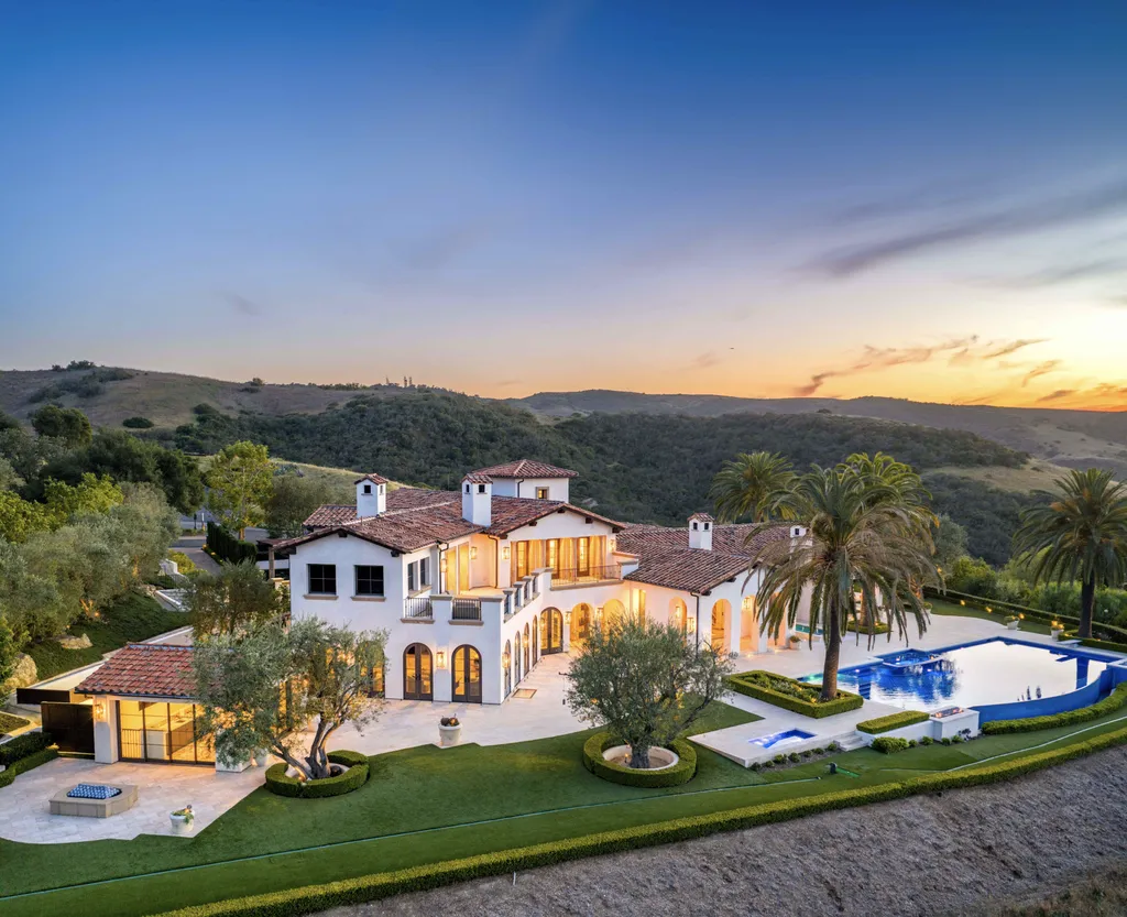 $38,500,000 Shady Canyon Estate in Irvine Blends Contemporary European Design With Nearly an Acre of Privacy 3 76 Golden Eagle luxury estate in Irvine overlooking Shady Canyon hills with resort-style pool and Mediterranean-inspired architecture at sunset