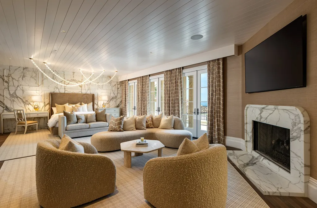 $38,500,000 Shady Canyon Estate in Irvine Blends Contemporary European Design With Nearly an Acre of Privacy 4 Primary suite at 76 Golden Eagle in Shady Canyon featuring marble accents, fireplace, sitting area, and private terrace access