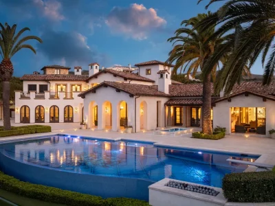 $38,500,000 Shady Canyon Estate in Irvine Blends Contemporary European Design With Nearly an Acre of Privacy 1 Luxury estate at 76 Golden Eagle in Shady Canyon Irvine featuring an infinity pool, Mediterranean-inspired architecture, and landscaped grounds at dusk