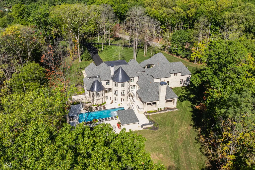 Newly Built $11.9 Million European-Inspired Estate Debuts on 14 Wooded Acres in Carmel, Indiana 15 Aerial view of the $11.9 million luxury estate on more than 14 private wooded acres in West Carmel, Indiana