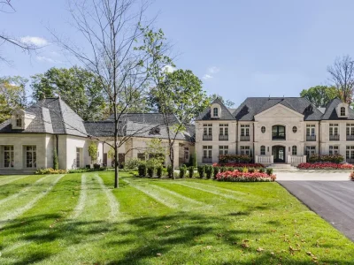 Newly Built $11.9 Million European-Inspired Estate Debuts on 14 Wooded Acres in Carmel, Indiana 1 Front exterior of the $11.9 million European-inspired luxury estate at 10585 Hussey Lane in Carmel, Indiana
