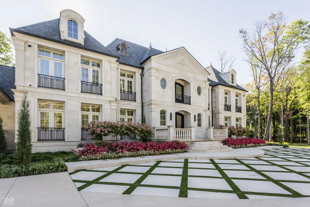 Newly Built $11.9 Million European-Inspired Estate Debuts on 14 Wooded Acres in Carmel, Indiana 2 Grand limestone façade of the $11.9 million European-inspired luxury estate at 10585 Hussey Lane in Carmel, Indiana