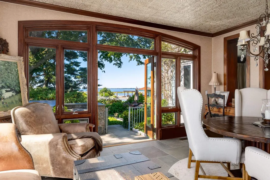 Connecticut’s Most Expensive Home Hits the Market for $100 Million: Historic Waterfront Estate Cedar Cliff Debuts in Greenwich 3 Elegant waterfront sitting room at Cedar Cliff estate featuring panoramic Long Island Sound views in Riverside Connecticut