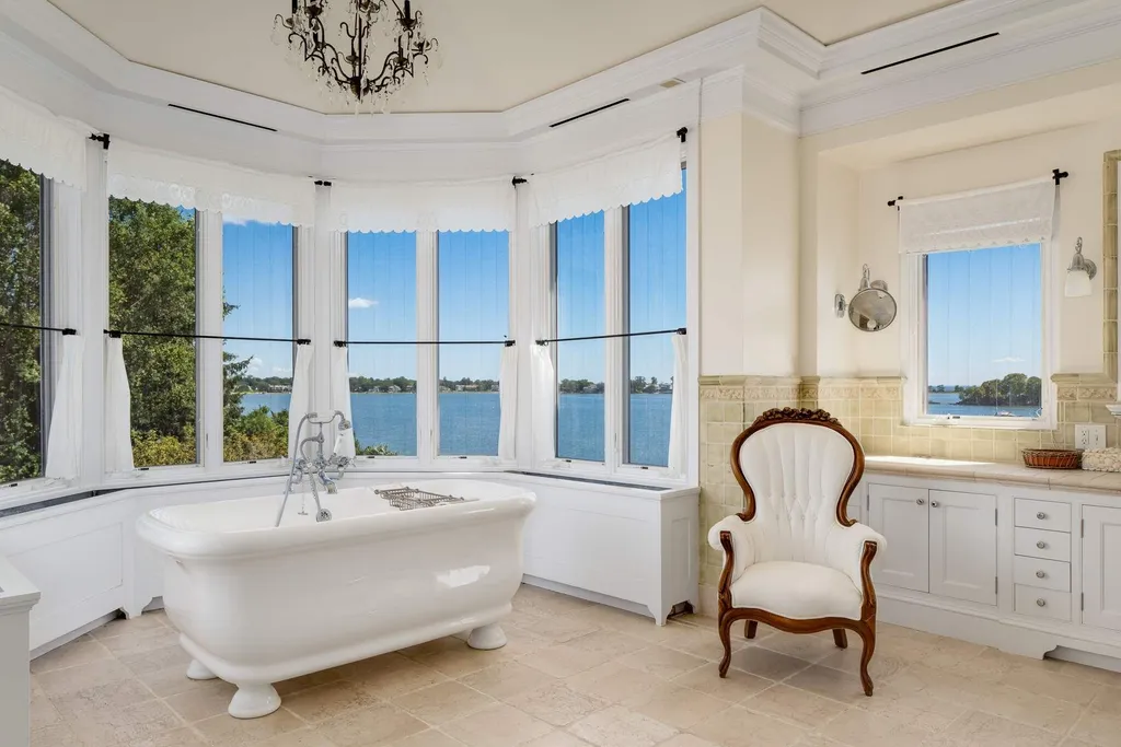 Connecticut’s Most Expensive Home Hits the Market for $100 Million: Historic Waterfront Estate Cedar Cliff Debuts in Greenwich 6 Luxury bathroom at Cedar Cliff estate featuring a freestanding tub and panoramic Long Island Sound views
