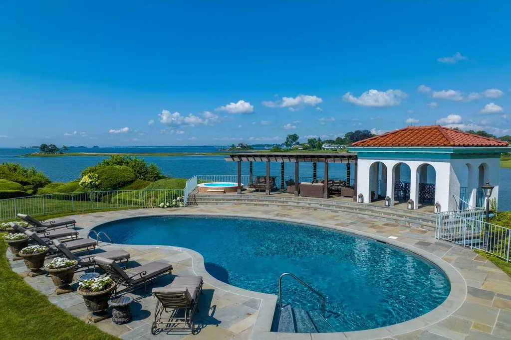 Connecticut’s Most Expensive Home Hits the Market for $100 Million: Historic Waterfront Estate Cedar Cliff Debuts in Greenwich 11 Resort-style waterfront pool and cabana at Cedar Cliff estate overlooking Long Island Sound in Riverside Connecticut