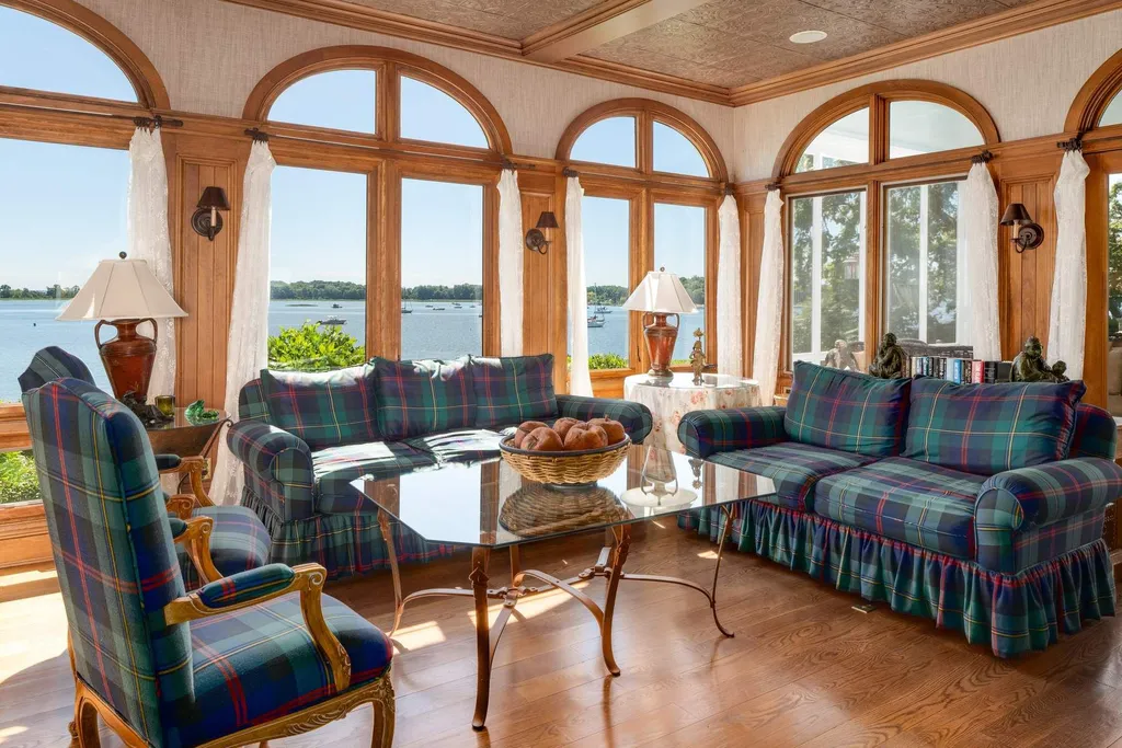 Connecticut’s Most Expensive Home Hits the Market for $100 Million: Historic Waterfront Estate Cedar Cliff Debuts in Greenwich 7 Elegant waterfront sunroom at Cedar Cliff estate with panoramic Long Island Sound views in Riverside Connecticut