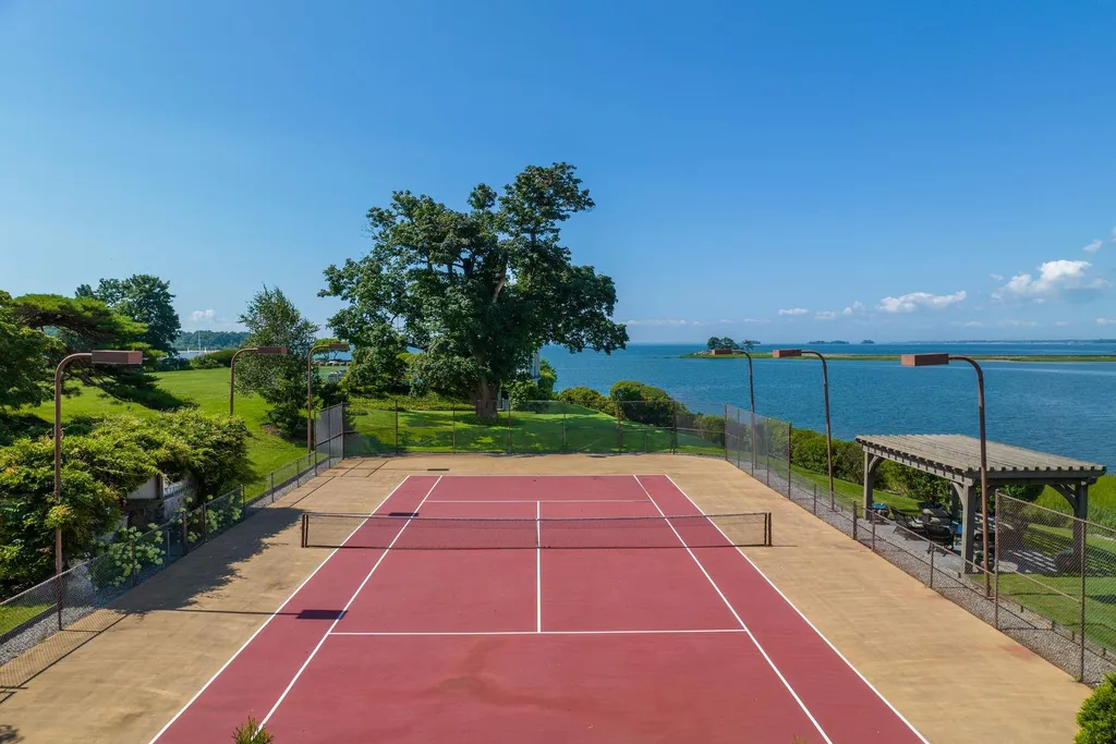 Connecticut’s Most Expensive Home Hits the Market for $100 Million: Historic Waterfront Estate Cedar Cliff Debuts in Greenwich 10 Private waterfront tennis court at Cedar Cliff estate overlooking Long Island Sound in Riverside Connecticut