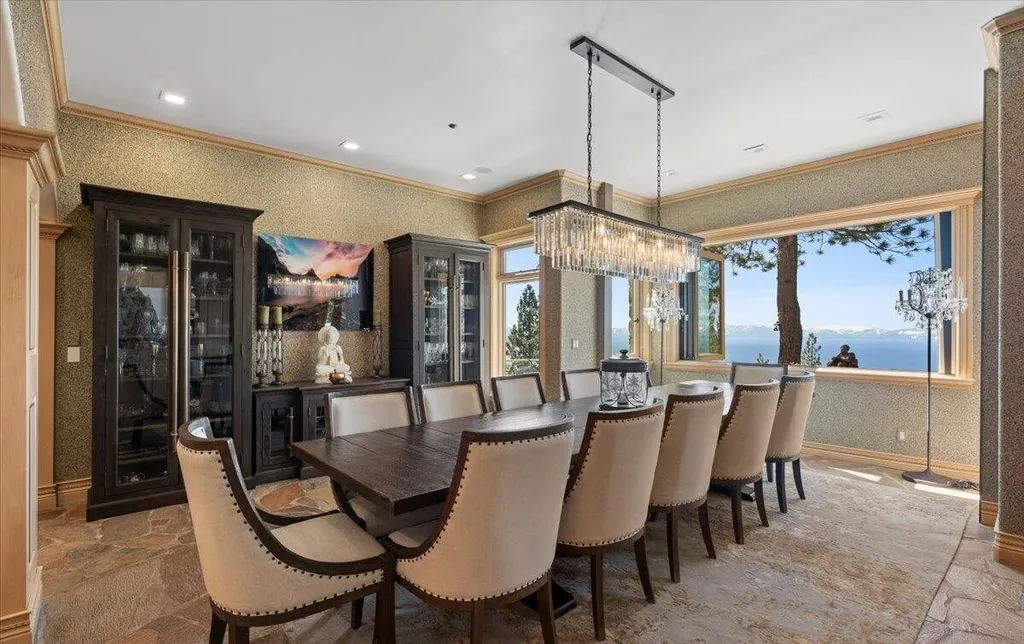 Former Home of a Rock and Roll Hall of Famer Above Lake Tahoe Lists for $43 Million 6 Formal dining room at the Lake Tahoe estate featuring seating for ten and panoramic views of Lake Tahoe and the Sierra Nevada