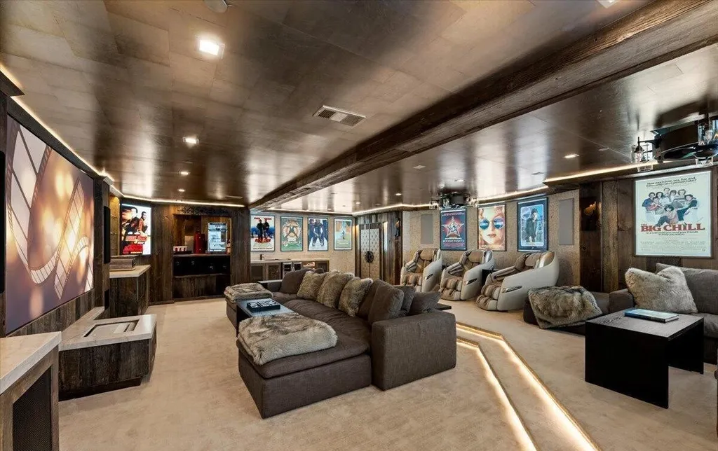 Former Home of a Rock and Roll Hall of Famer Above Lake Tahoe Lists for $43 Million 10 Private luxury home theater with reclining seats, movie posters and custom cinema setup inside the Lake Tahoe estate