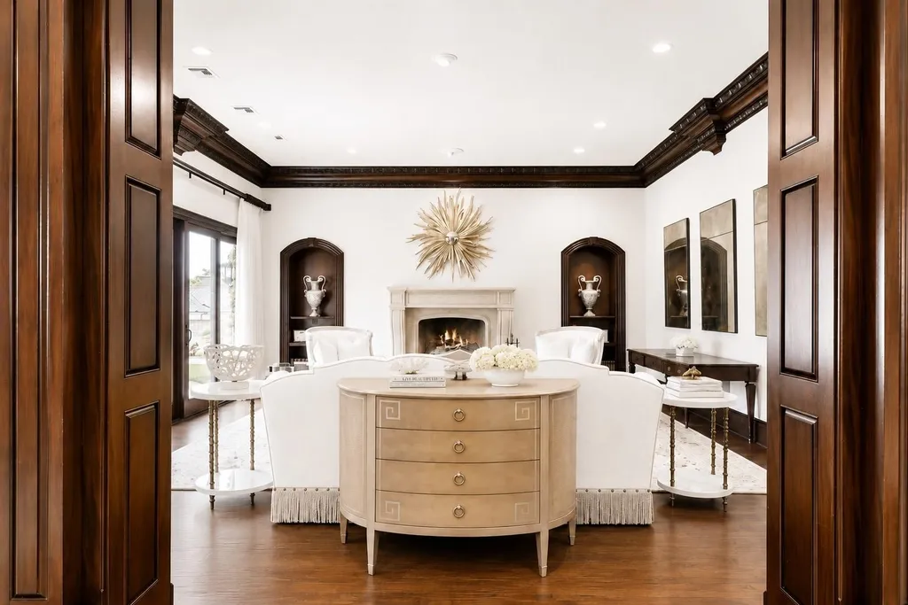 This $11.9 Million Plano Estate Occupies Former Willow Bend Polo Grounds and Spans Nearly Two Acres 6 Elegant formal living room at the Kings Gate estate in Plano Texas featuring a limestone fireplace, custom millwork and refined luxury interiors
