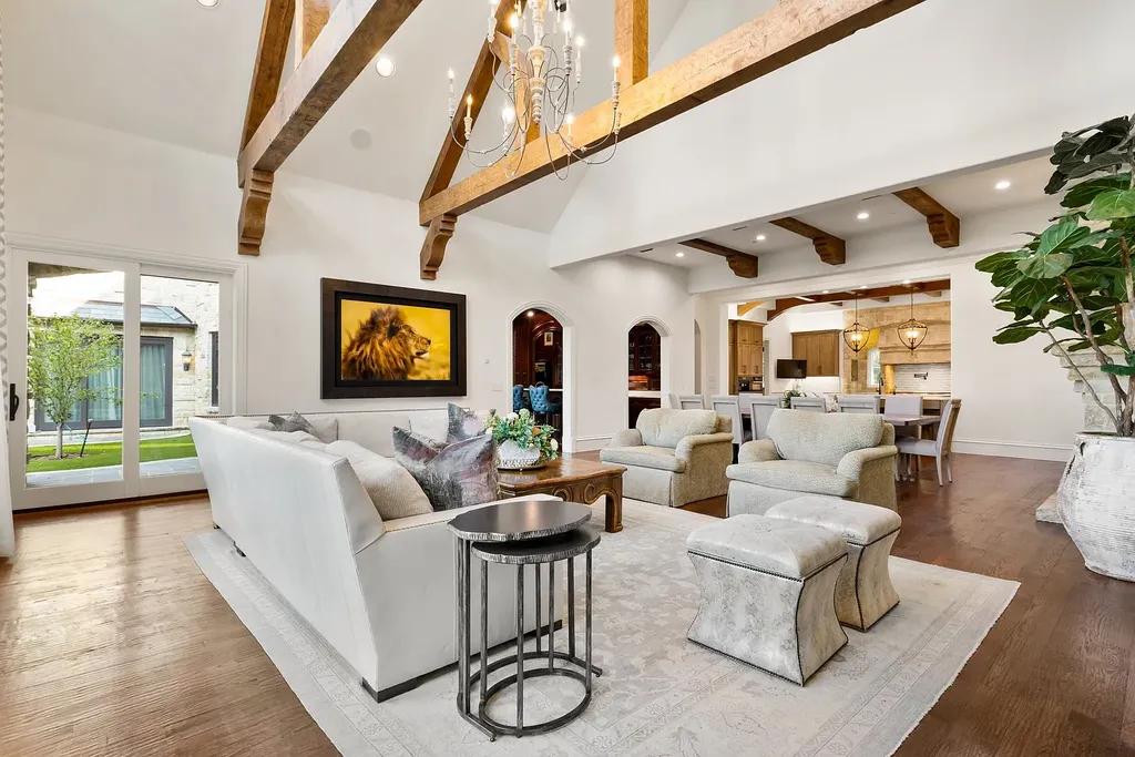 This $11.9 Million Plano Estate Occupies Former Willow Bend Polo Grounds and Spans Nearly Two Acres 5 Open-concept family room at the Kings Gate estate in Plano Texas featuring vaulted ceilings, exposed timber beams and luxury living spaces