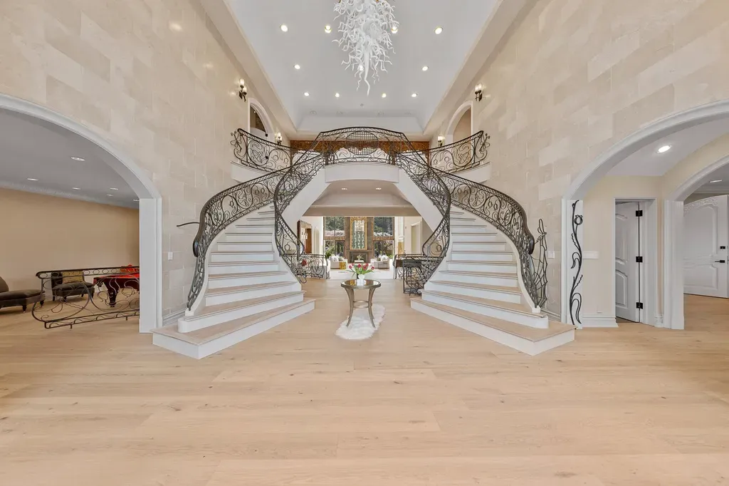 This $6.88 Million New Jersey Mansion Has a Recording Studio—and Manhattan Is Just Eight Miles Away 4 10 Double Bridal Staircase entry foyer 1