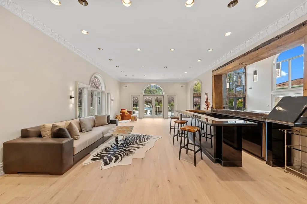 This $6.88 Million New Jersey Mansion Has a Recording Studio—and Manhattan Is Just Eight Miles Away 6 13 lounge at 142 Hoover dr in Cresskill NJ Proper 1
