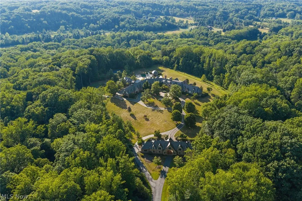 This $12.995 Million Ohio Estate Has 128 Acres, an Indoor Pool and a Two-Story Rock-Climbing Wall 2 14398 County Line Rd Hunting Valley OH 4402202
