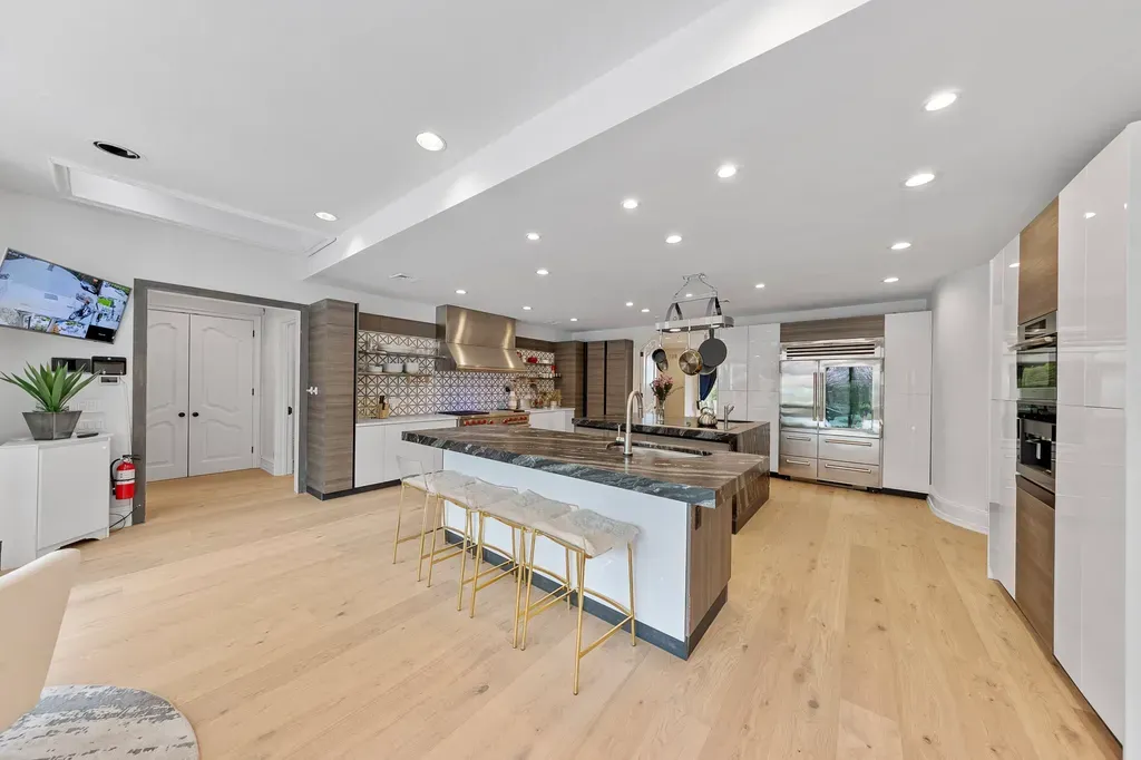 This $6.88 Million New Jersey Mansion Has a Recording Studio—and Manhattan Is Just Eight Miles Away 7 15 renovated kitchen 142 Hoover dr in Cresskill NJ Proper 1