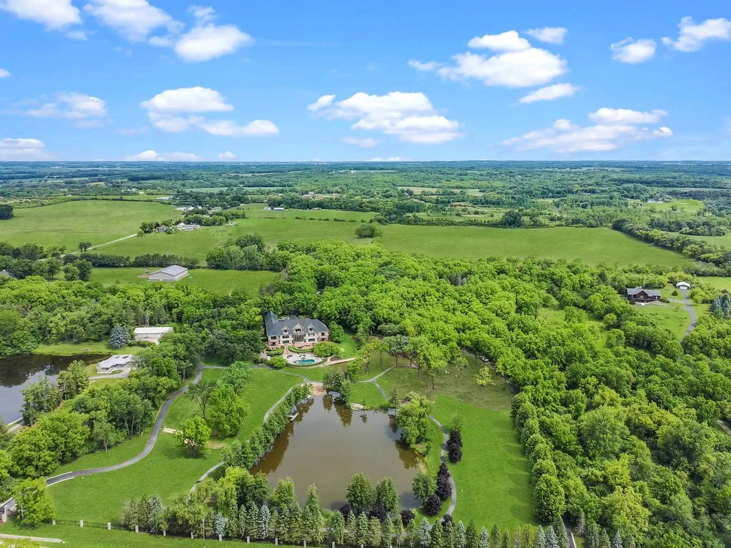 A $5.995 Million Illinois Mansion Hides a 30-Car Garage, Helipad and Private Lake Behind Its Gates 15 19802 Dunham Rd Woodstock IL 60098009