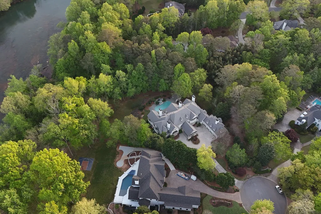Behind This $3.4 Million Atlanta-Area Estate Is Something Only 14 Homes in the Community Can Claim 22 510 Covington Cv Johns Creek GA 3002242