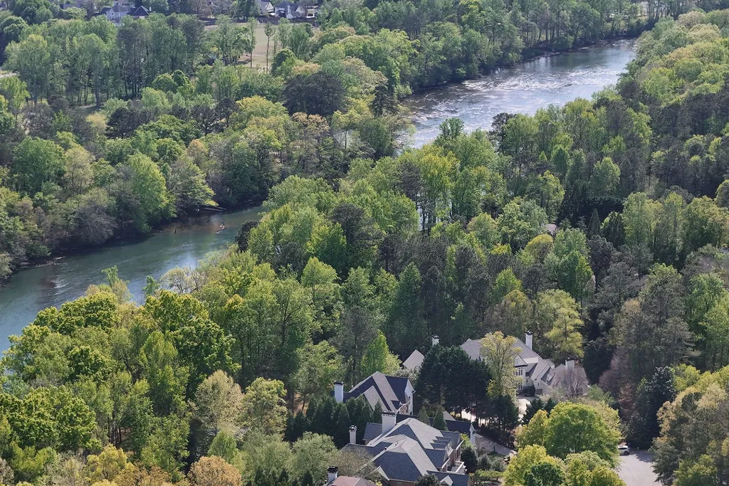 Behind This $3.4 Million Atlanta-Area Estate Is Something Only 14 Homes in the Community Can Claim 23 510 Covington Cv Johns Creek GA 3002244