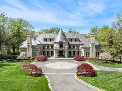 Behind the Gates of This $12.1 Million Greenwich Manor, a Four-Story Interior Gives Way to a Brookside Resort 1 Behind the Gates of This $12.1 Million Greenwich Manor, a Four-Story Interior Gives Way to a Brookside Resort