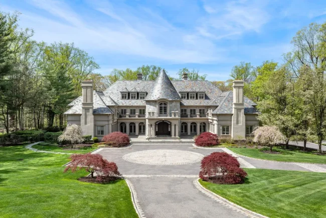 Behind the Gates of This $12.1 Million Greenwich Manor, a Four-Story Interior Gives Way to a Brookside Resort