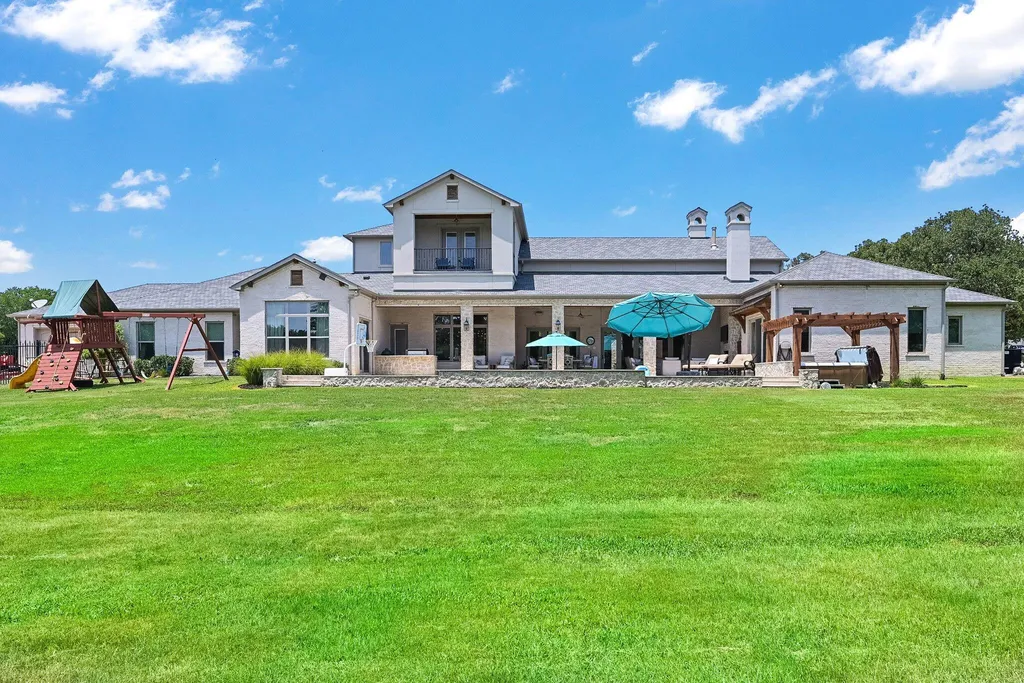 This $4.2 Million Texas Estate Packs a Private Resort, Guest House and Six-Car Collector’s Garage Into 6.29 Acres 15 7120 Shady Grove Rd Keller TX 7624839