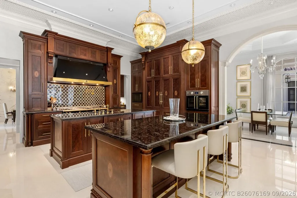 Reimagined Palm Beach Gardens Estate with Private Access to the First Hole at Old Palm Hits the Market for $23,500,000 8 11607 Charisma Way Palm Beach Gardens FL29