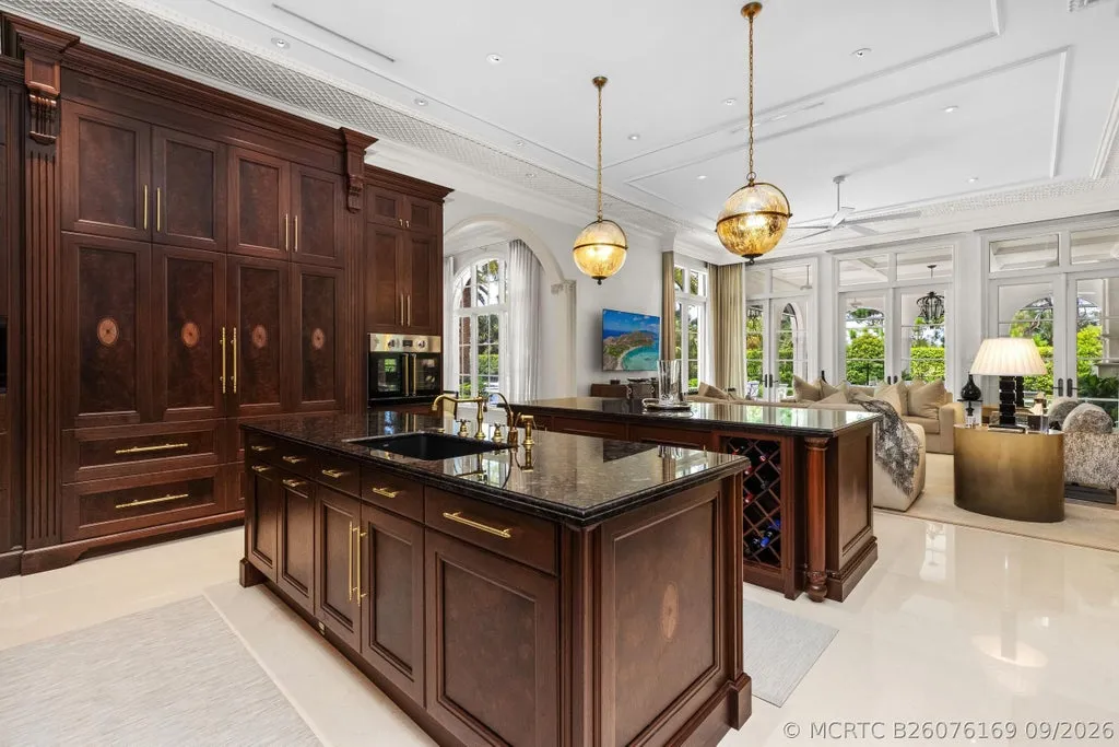 Reimagined Palm Beach Gardens Estate with Private Access to the First Hole at Old Palm Hits the Market for $23,500,000 9 11607 Charisma Way Palm Beach Gardens FL30