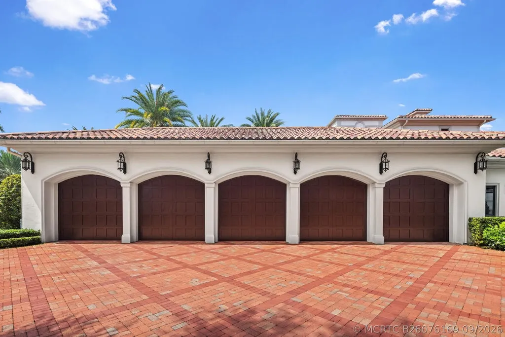 Reimagined Palm Beach Gardens Estate with Private Access to the First Hole at Old Palm Hits the Market for $23,500,000 14 11607 Charisma Way Palm Beach Gardens FL55