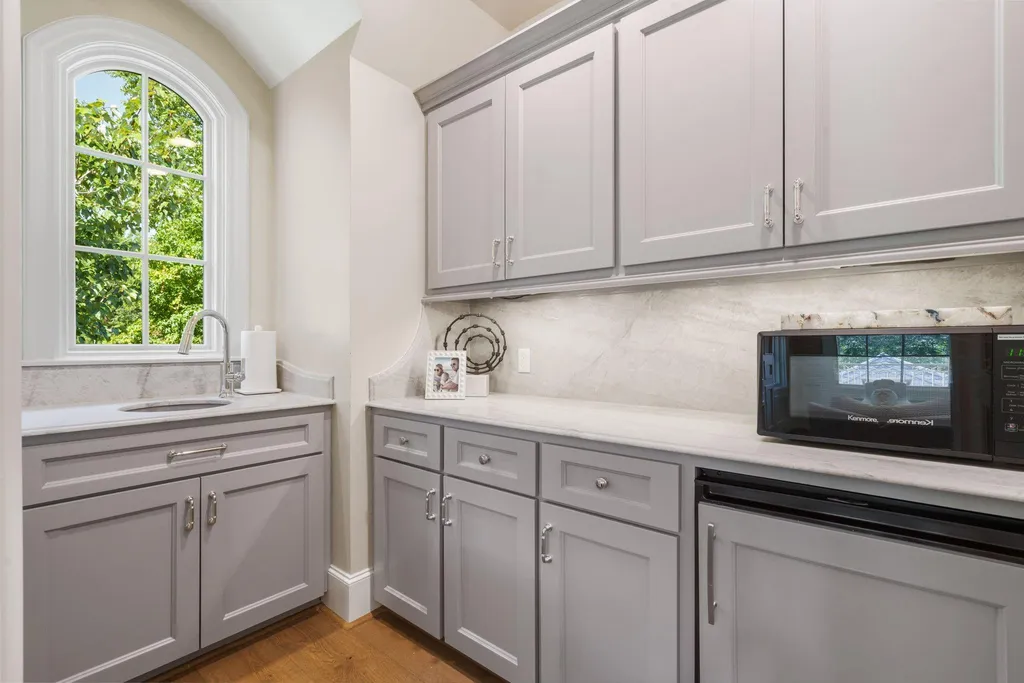Reimagined French Country Estate With a La Cornue Kitchen Lists for $3,295,000 in Carlton Woods 17 26 N Palmiera Cir Spring TX 7738226