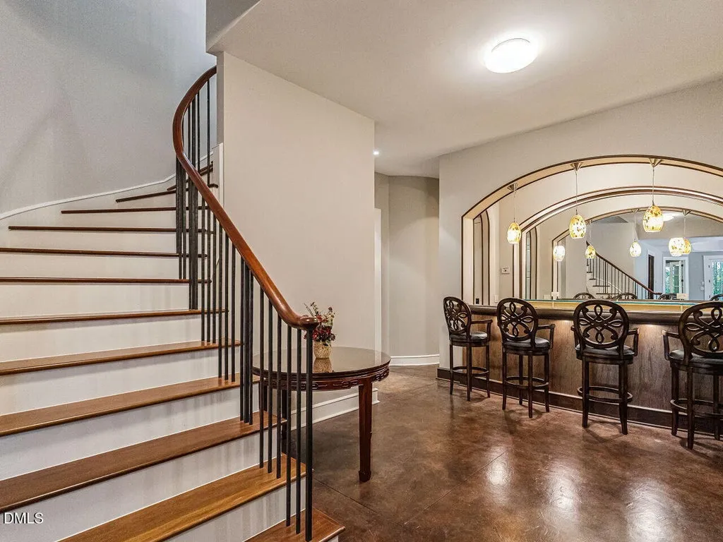 Sprawling Chapel Hill Estate with a 500-Bottle Wine Cellar and Resort-Style Grounds Hits the Market for $4,200,000 14 32520 Archdale Dr Chapel Hill NC 2751734 1