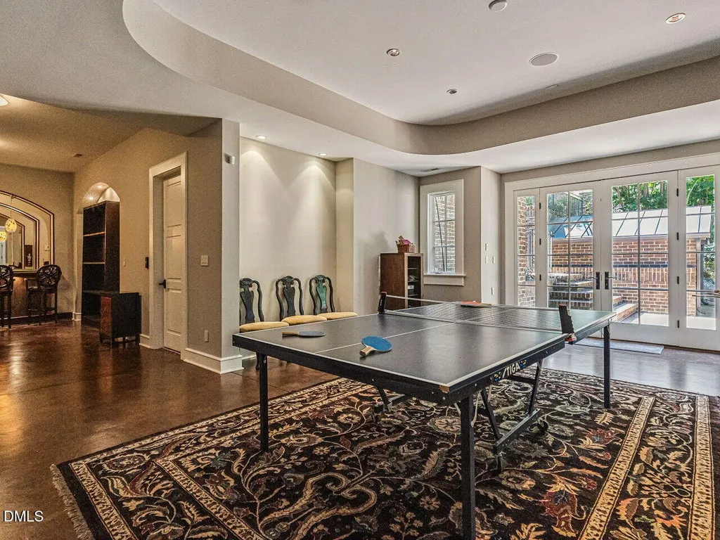 Sprawling Chapel Hill Estate with a 500-Bottle Wine Cellar and Resort-Style Grounds Hits the Market for $4,200,000 18 32520 Archdale Dr Chapel Hill NC 2751740