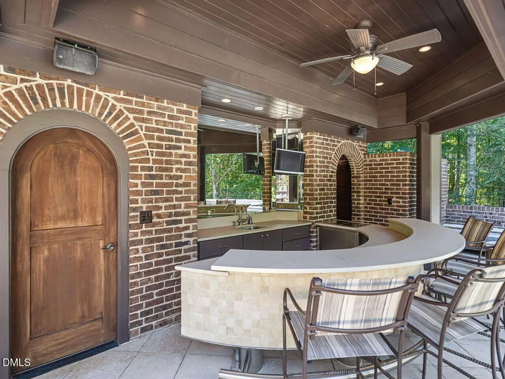 Sprawling Chapel Hill Estate with a 500-Bottle Wine Cellar and Resort-Style Grounds Hits the Market for $4,200,000 19 32520 Archdale Dr Chapel Hill NC 2751745
