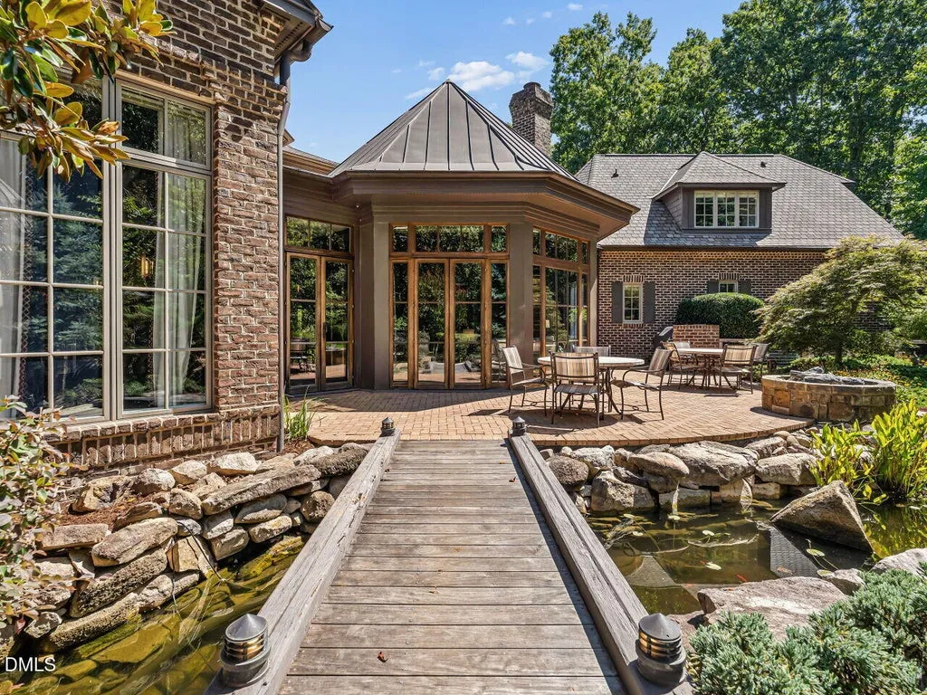 Sprawling Chapel Hill Estate with a 500-Bottle Wine Cellar and Resort-Style Grounds Hits the Market for $4,200,000 21 32520 Archdale Dr Chapel Hill NC 2751747