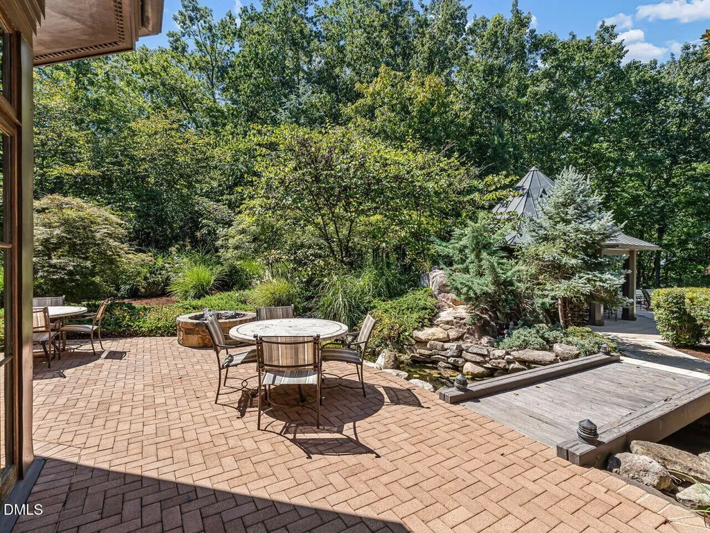 Sprawling Chapel Hill Estate with a 500-Bottle Wine Cellar and Resort-Style Grounds Hits the Market for $4,200,000 22 32520 Archdale Dr Chapel Hill NC 2751748