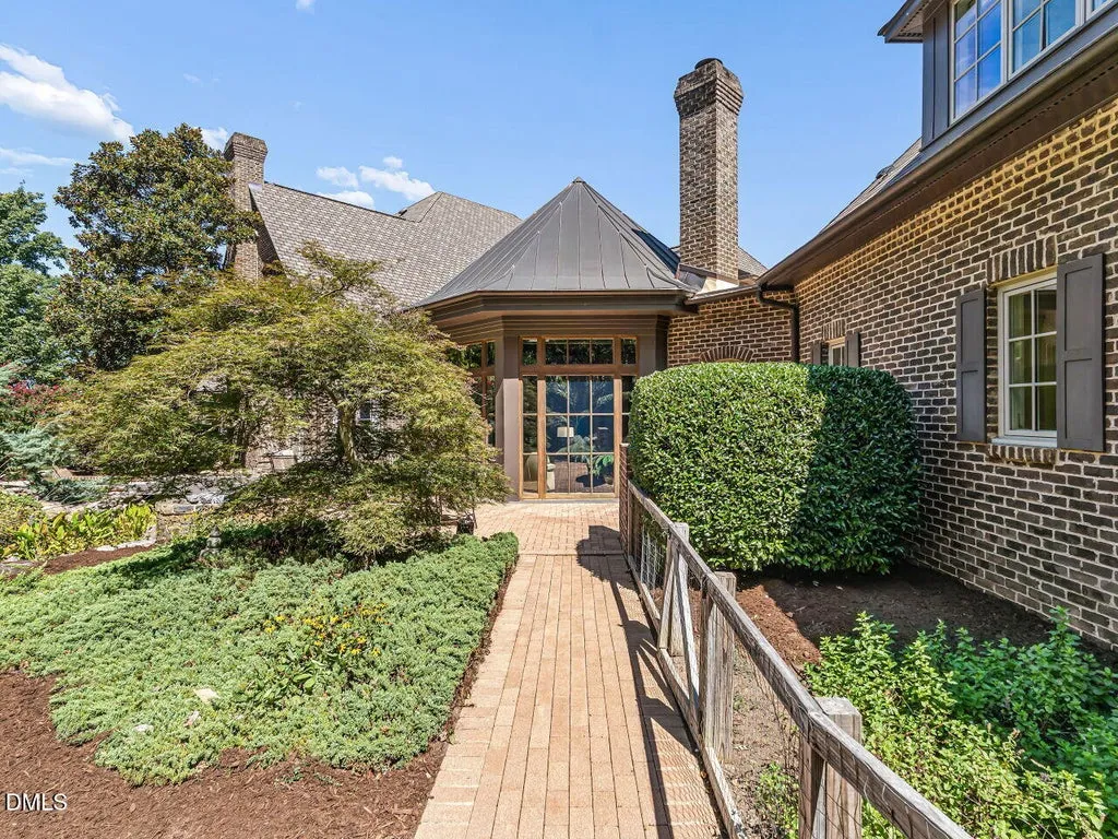 Sprawling Chapel Hill Estate with a 500-Bottle Wine Cellar and Resort-Style Grounds Hits the Market for $4,200,000 24 32520 Archdale Dr Chapel Hill NC 2751750