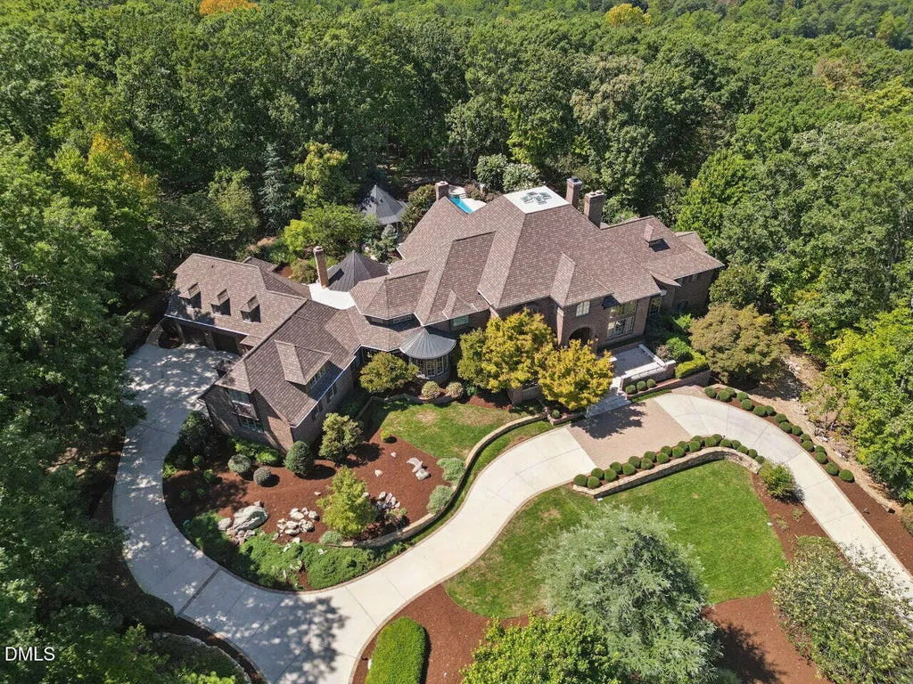 Sprawling Chapel Hill Estate with a 500-Bottle Wine Cellar and Resort-Style Grounds Hits the Market for $4,200,000 26 32520 Archdale Dr Chapel Hill NC 2751754