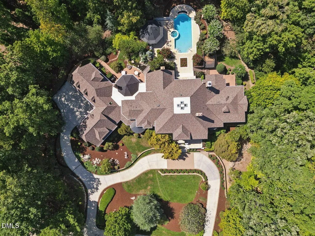 Sprawling Chapel Hill Estate with a 500-Bottle Wine Cellar and Resort-Style Grounds Hits the Market for $4,200,000 27 32520 Archdale Dr Chapel Hill NC 2751757