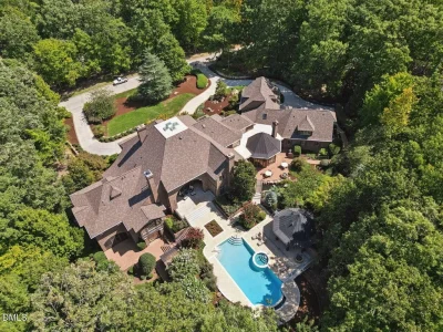 Sprawling Chapel Hill Estate with a 500-Bottle Wine Cellar and Resort-Style Grounds Hits the Market for $4,200,000 3 Sprawling Chapel Hill Estate with a 500-Bottle Wine Cellar and Resort-Style Grounds Hits the Market for $4,200,000