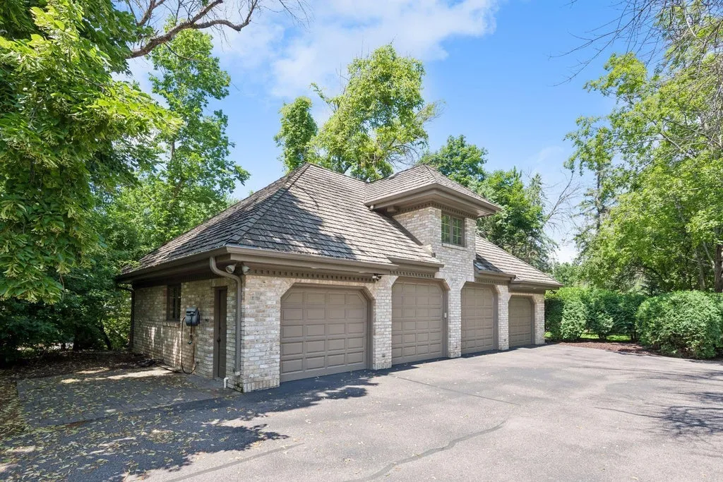 Resort-Like Wayzata Estate With a Private Movie Theater and Full Tennis Court Lists for $5.922 Million 26 326 Ferndale Rd W Wayzata MN 55391101