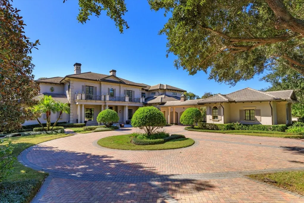 Elegant Isleworth Lakefront Estate With a Hidden Passage and Private Boat Dock Lists for $19,500,000 2 5192 VARDON DRIVE WINDERMERE FL 3478601