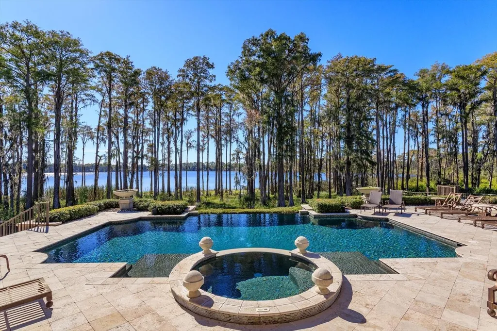 Elegant Isleworth Lakefront Estate With a Hidden Passage and Private Boat Dock Lists for $19,500,000 18 5192 VARDON DRIVE WINDERMERE FL 3478602
