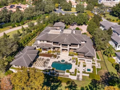 Elegant Isleworth Lakefront Estate With a Hidden Passage and Private Boat Dock Lists for $19,500,000 1 Elegant Isleworth Lakefront Estate With a Hidden Passage and Private Boat Dock Lists for $19,500,000