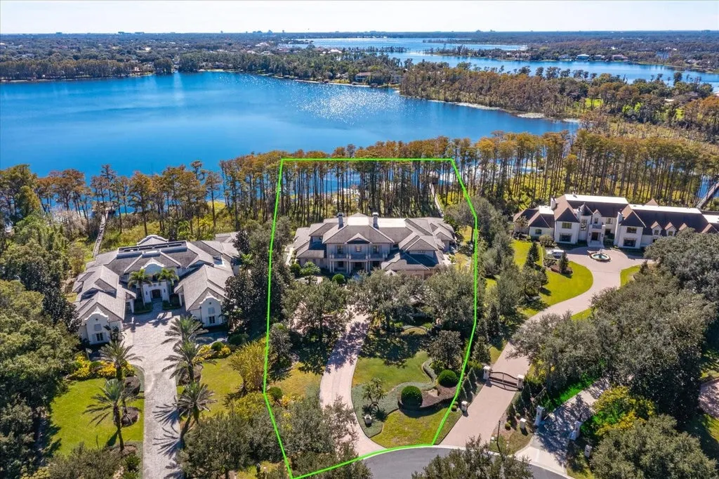 Elegant Isleworth Lakefront Estate With a Hidden Passage and Private Boat Dock Lists for $19,500,000 26 5192 VARDON DRIVE WINDERMERE FL 3478606