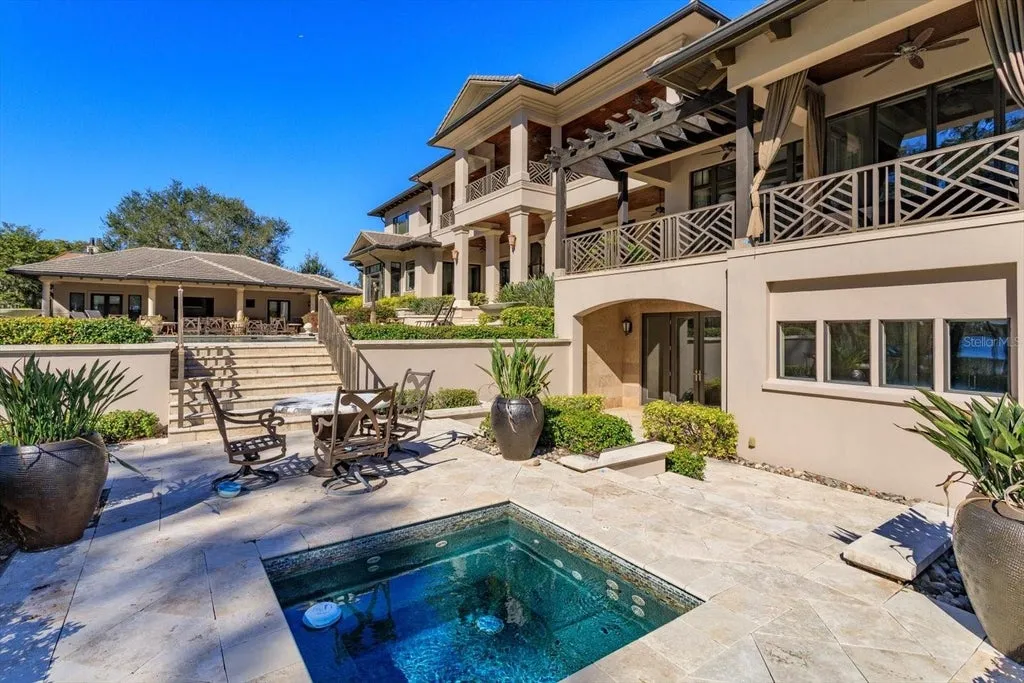 Elegant Isleworth Lakefront Estate With a Hidden Passage and Private Boat Dock Lists for $19,500,000 19 5192 VARDON DRIVE WINDERMERE FL 3478609