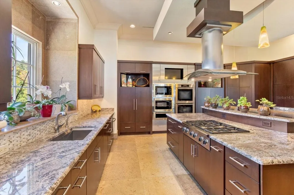 Elegant Isleworth Lakefront Estate With a Hidden Passage and Private Boat Dock Lists for $19,500,000 15 5192 VARDON DRIVE WINDERMERE FL 3478616