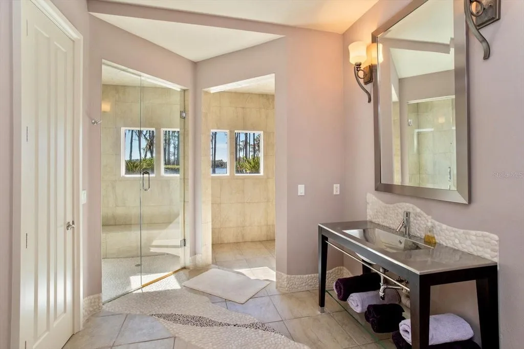 Elegant Isleworth Lakefront Estate With a Hidden Passage and Private Boat Dock Lists for $19,500,000 25 5192 VARDON DRIVE WINDERMERE FL 3478634