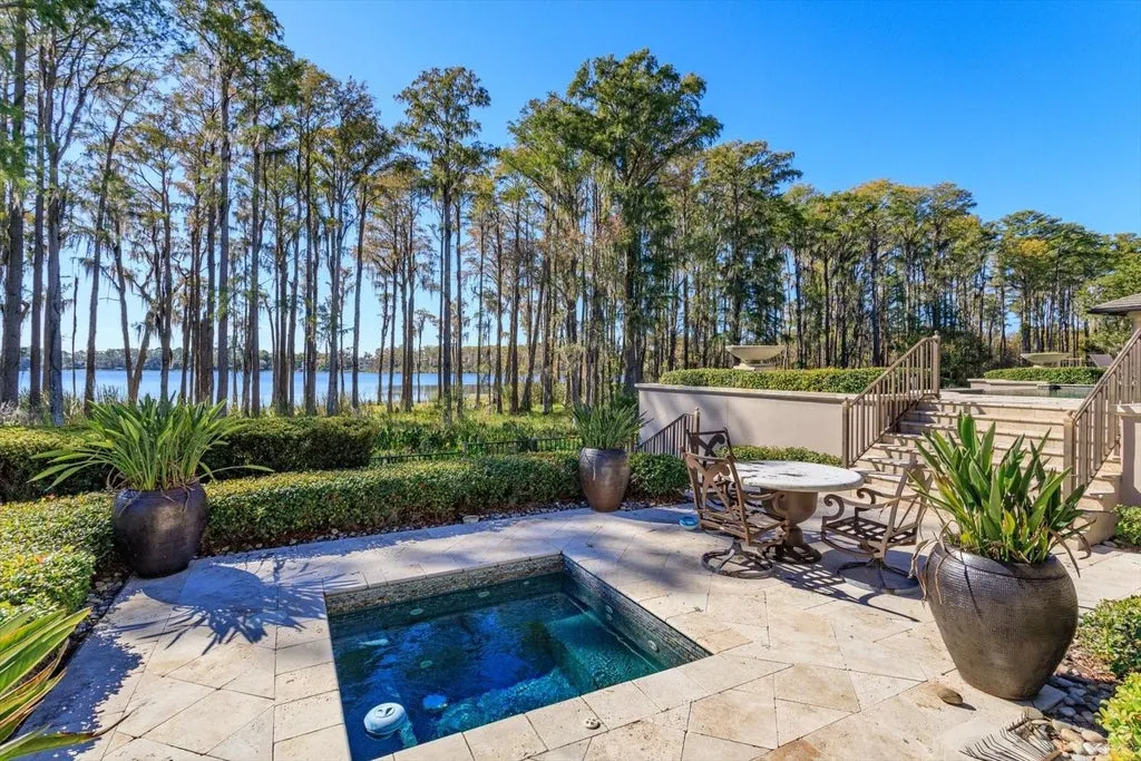 Elegant Isleworth Lakefront Estate With a Hidden Passage and Private Boat Dock Lists for $19,500,000 13 5192 VARDON DRIVE WINDERMERE FL 3478635
